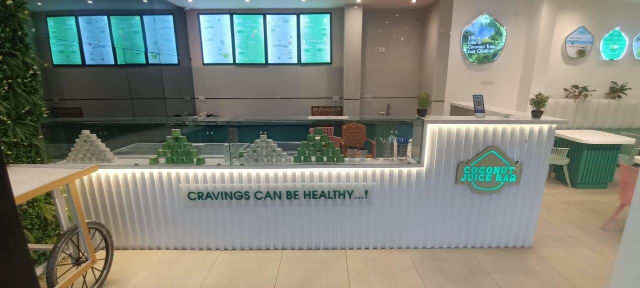 Service counter with healthy cravings message and menu displays